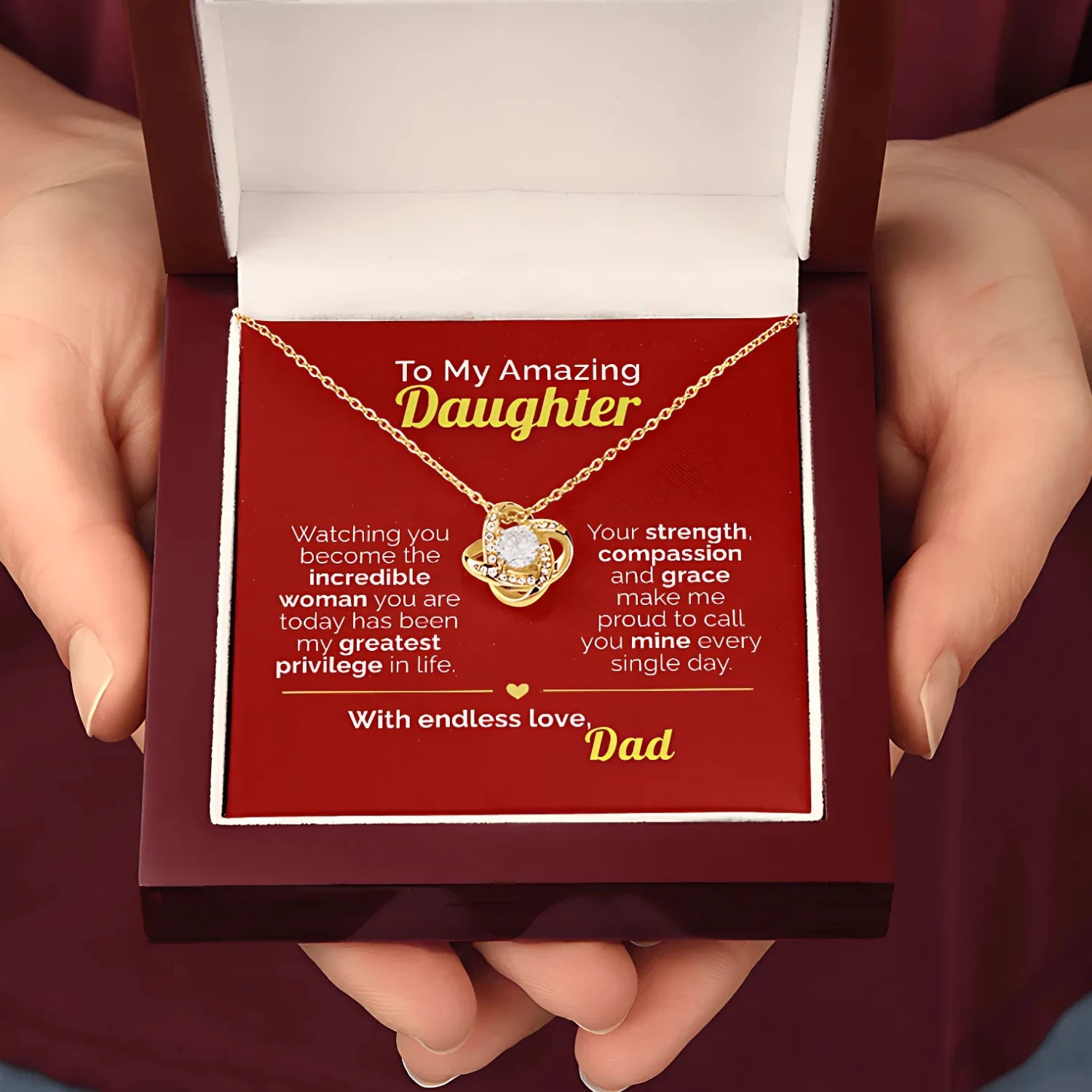 Necklace with a heart-shaped pendant in a box with a message to an amazing daughter from Dad.